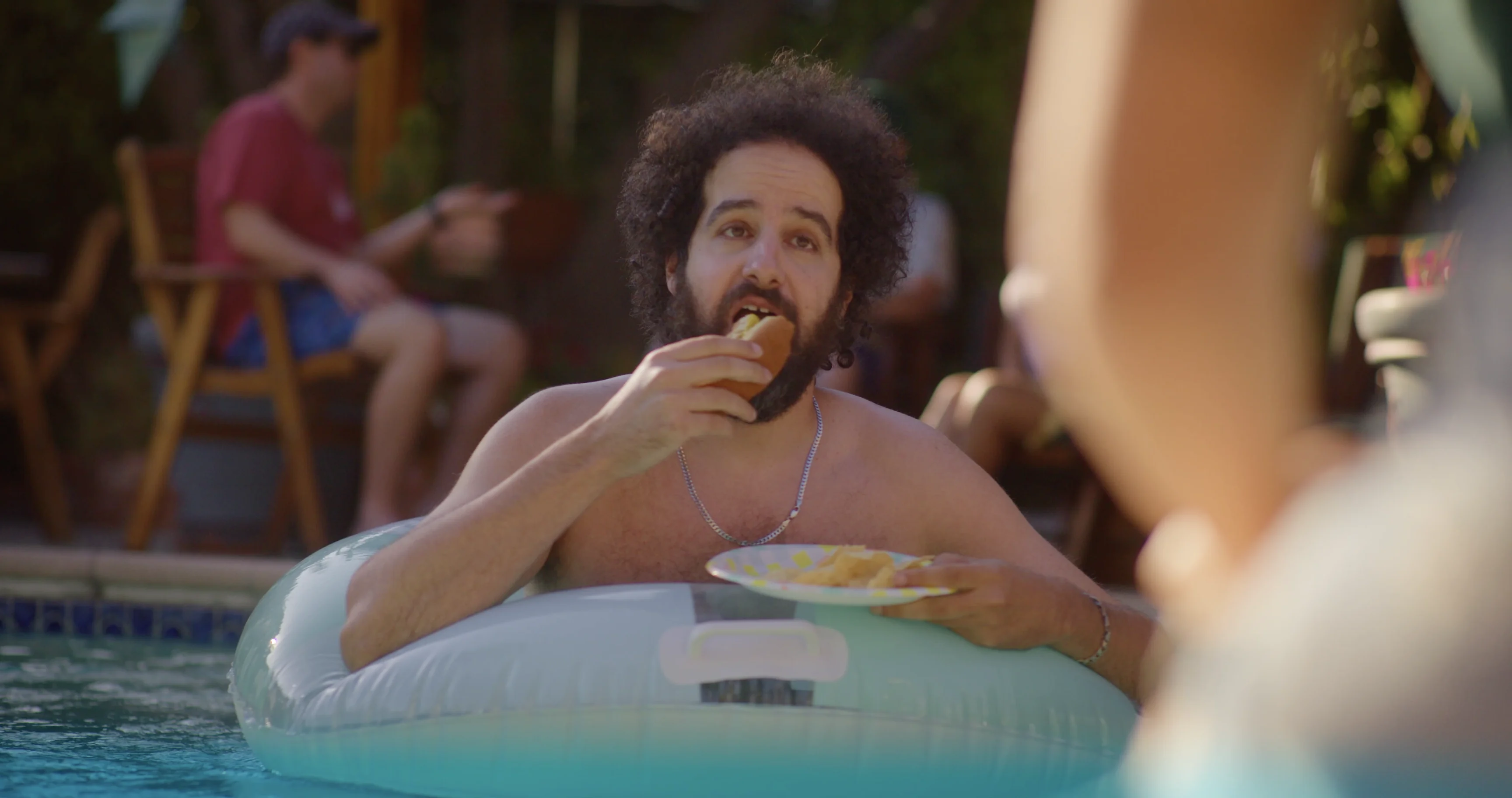 Charles with a hot dog